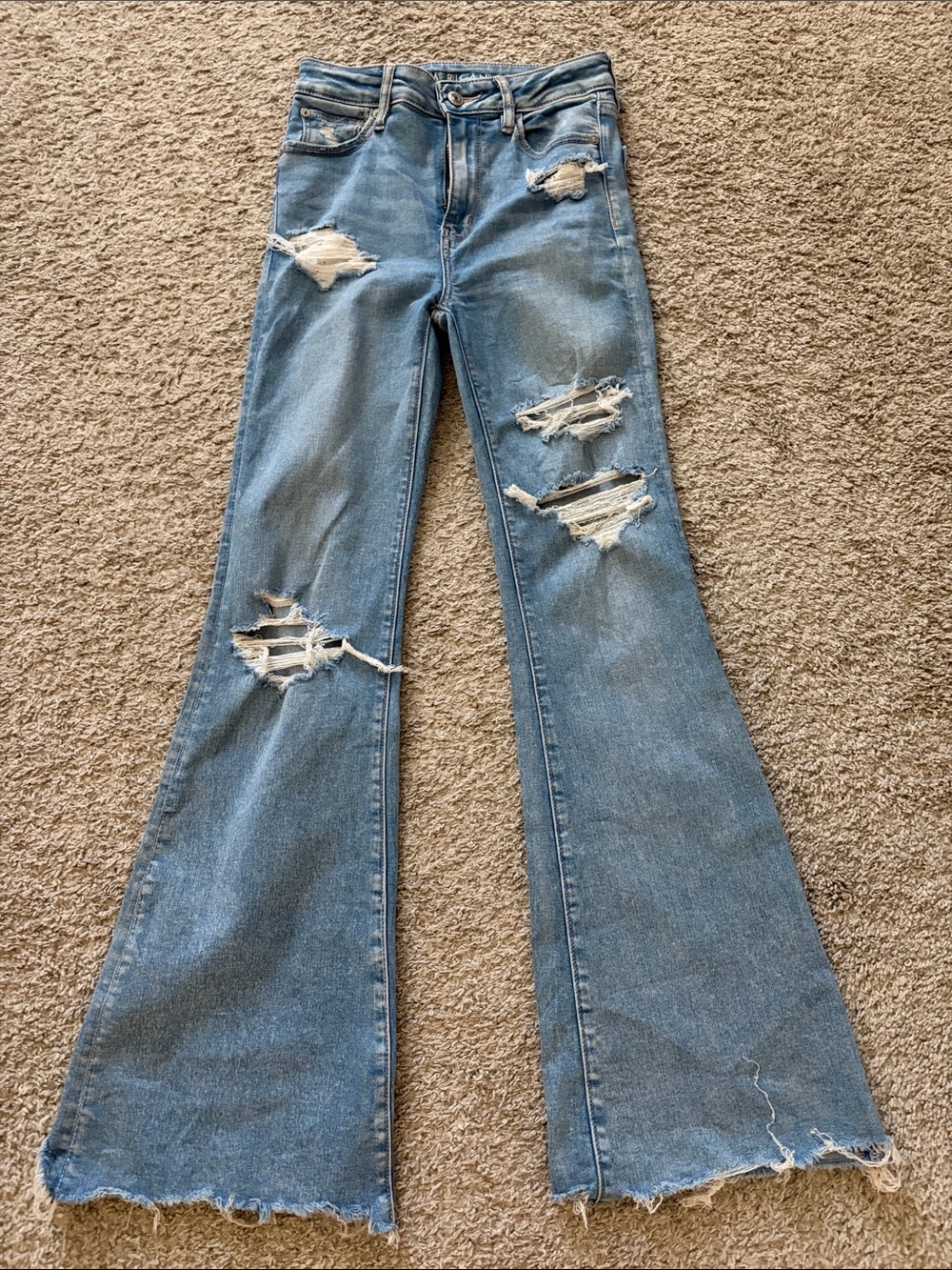 American Eagle Outfitters Light Blue Ripped Flare Jeans